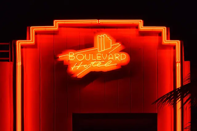 Neon sign of the Boulevard Hotel at night on Ocean Drive in the Miami Beach Art Deco District, Florida