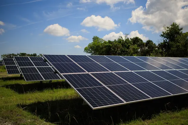 Rows of solar panels at Florida Power & Light's Discovery Solar Energy Center at Kennedy Space Center, Florida